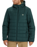 The Billabong Mens Journey Puffer Jacket in Dark Forest