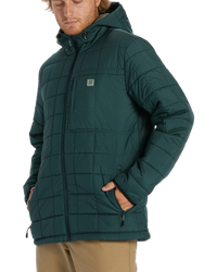 The Billabong Mens Journey Puffer Jacket in Dark Forest