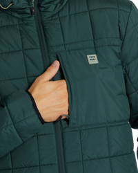 The Billabong Mens Journey Puffer Jacket in Dark Forest