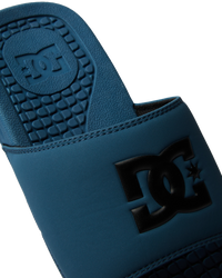 The DC Shoes Mens Bolsa Sliders in Dark Teal