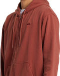 The Quiksilver Mens Salt Water Zip Hoodie in Henna