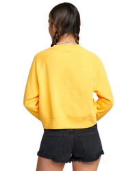 The RVCA Womens Oasis Fleece Sweatshirt in Marigold