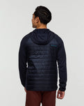 The Cotopaxi Mens Capa Hybrid Insulated Hooded Jacket in Carbon