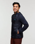 The Cotopaxi Mens Capa Hybrid Insulated Hooded Jacket in Carbon