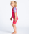 The C-Skins Girls C-Kid Baby Shorty Wetsuit in Coral, Lilac & Bright Coral