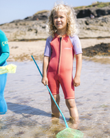 The C-Skins Girls C-Kid Baby Shorty Wetsuit in Coral, Lilac & Bright Coral