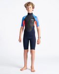 The C-Skins Boys Element 3/2mm Back Zip Shorty Wetsuit in Navy, Flo Red & Blue Tie Dye