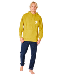 The Rip Curl Mens SWC Sun Hoodie in Vintage Yellow