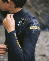 The C-Skins Boys NuWave Session 4/3mm Chest Zip Wetsuit in Bluestone, Meteor X & Saffron