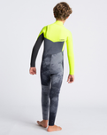 The C-Skins Boys Sessions 4/3mm Chest Zip Wetsuit in Black Tie Dye, Yellow & Graphite