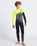 The C-Skins Boys Sessions 4/3mm Chest Zip Wetsuit in Black Tie Dye, Yellow & Graphite