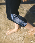 The C-Skins Womens Solace 1.5mm 3/4 Neoprene Leggings in Raven Black & Tropical