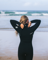 The C-Skins Womens Solace 5/4mm Chest Zip Wetsuit in Black, Tropical Black & White
