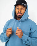 The Salt Water Seeker Mens Golden Hoodie in Blue Dusk