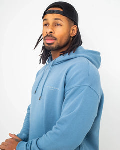 The Salt Water Seeker Mens Golden Hoodie in Blue Dusk