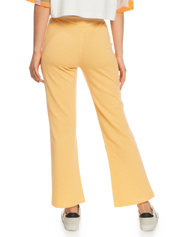 The Quiksilver Womens Collection Womens Seventies Mind Joggers in Saffron