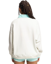 The Quiksilver Womens Collection Womens Stranger Things Lenora 1/2 Zip Sweatshirt in Snow White