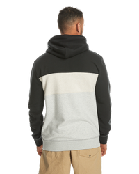 The Quiksilver Mens Emboss Block Hoodie in Black