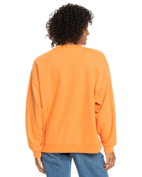 The Roxy Womens Take Your Place Sweatshirt in Tangerine