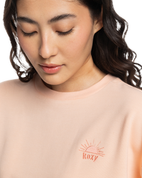 The Roxy Womens Surfing By Moonlight Sweatshirt in Peach Parfait