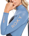 The Roxy Womens Prologue 4/3mm Back Zip Wetsuit in Cloud Black, Powder Grey & Sunglow