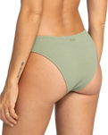 The Roxy Womens Essaouira Moderate High Leg Bikini Bottoms in Oil Green