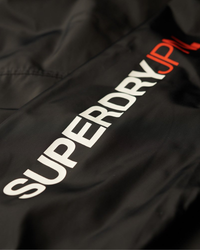 The Superdry Mens Hooded SD Windbreaker Jacket in Eclipse Navy