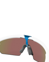 The Oakley Sphaera Prizm Polarised Sunglasses in Matte White & Prizm Sapphire