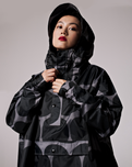 The Rain Kiss Womens Rain Poncho in Black Polka