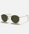 The Ray-Ban Round Metal Sunglasses in Black & Gold
