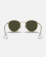 The Ray-Ban Round Metal Sunglasses in Black & Gold