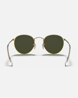 The Ray-Ban Round Metal Sunglasses in Black & Gold