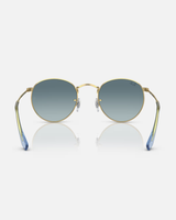 The Ray-Ban Round Metal Gradient Sunglasses in Polished Gold & Blue