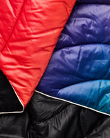 The Rumpl Original Puffy Blanket in Aurora Field