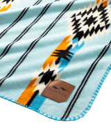 The Slowtide Journey Fleece Blanket in Light Blue