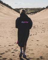 The Dryrobe Advance Short Sleeved (2022) in Black & Pink