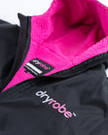 The Dryrobe Advance Short Sleeved in Black & Pink