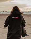 The Dryrobe Advance Long Sleeved in Black & Pink