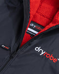 The Dryrobe Advance Long Sleeved Dryrobe in Black & Red