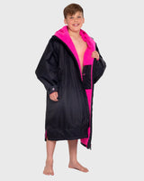 The Dryrobe Kids Advance Long Sleeved Dryrobe in Black & Pink