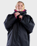 The Dryrobe Kids Advance Long Sleeved Dryrobe in Black & Pink