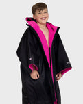 The Dryrobe Kids Advance Short Sleeved in Black & Pink