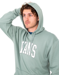 The Vans Mens Varsity Hoodie in Chinois Green