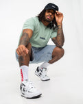 The Vans Mens Lower Corecase T-Shirt in Iceberg Green & Dress Blues