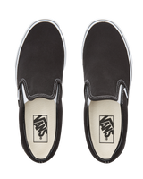 The Vans Womens Womens Classic Slip-On Shoes in Black