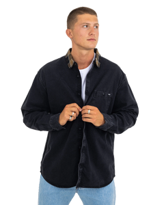 The Vans Mens Deerfiel Woven Shirt in Washed Black