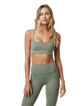 The Vuori Womens All The Feels Bra in Pistachio