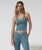 The Vuori Womens Halo Performance Crop Tank Top 2.0 in Smoke Blue Heather