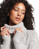 The Superdry Womens Chunky Cable Roll Neck Jumper in Off White