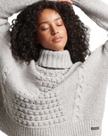 The Superdry Womens Chunky Cable Roll Neck Jumper in Off White